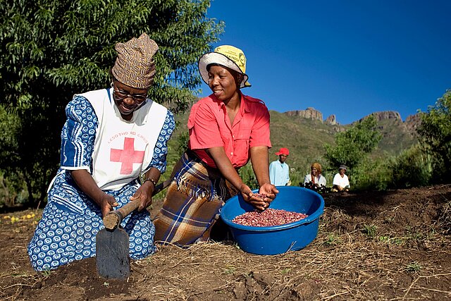 Two women with seeds