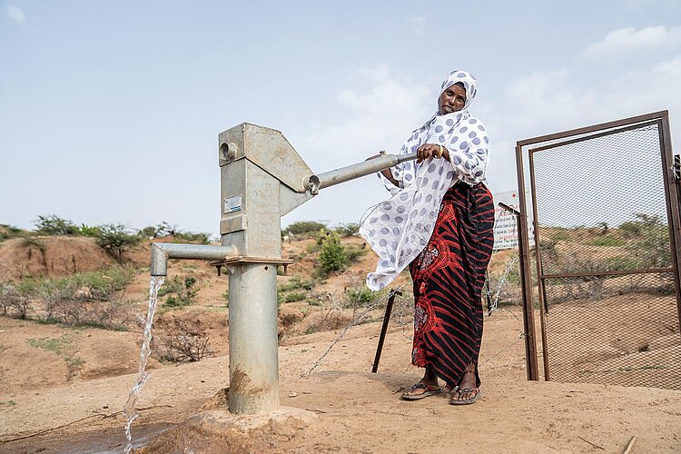 Woman at a well