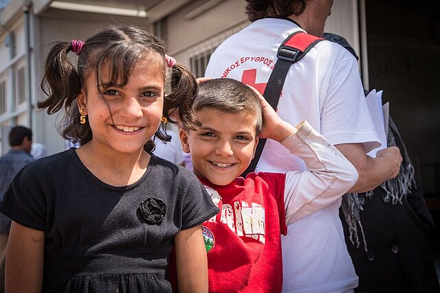 Girl and boy smiling