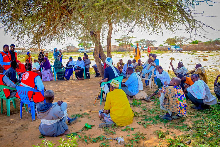 Volunteers with group of people