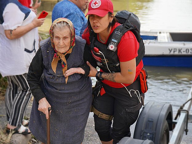 Volunteer supports senior citizen