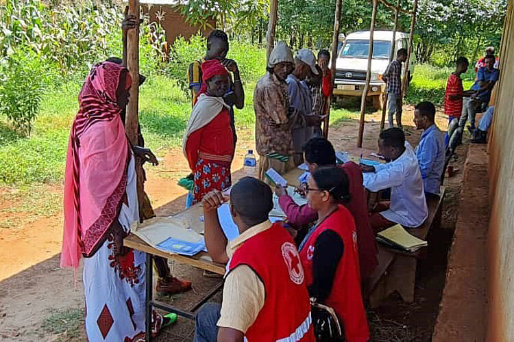 People attending cash transfers