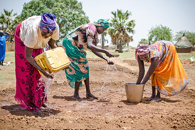 women working in garden