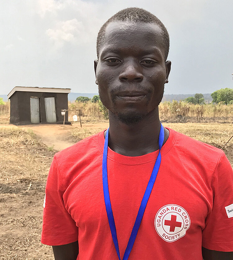 Helfer in Uganda Portrait eines ugandischen Rotkreuz-Mitarbeiters