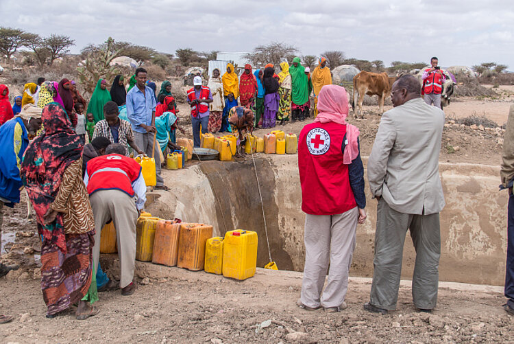People at water reservoir in Somalia