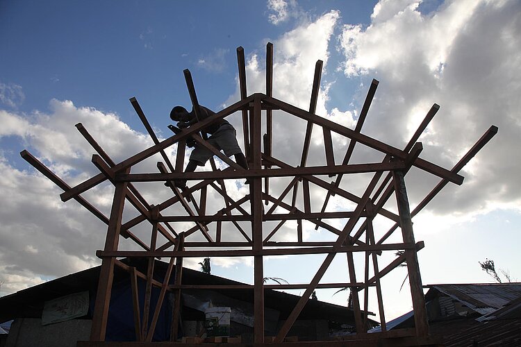 Man builing a house