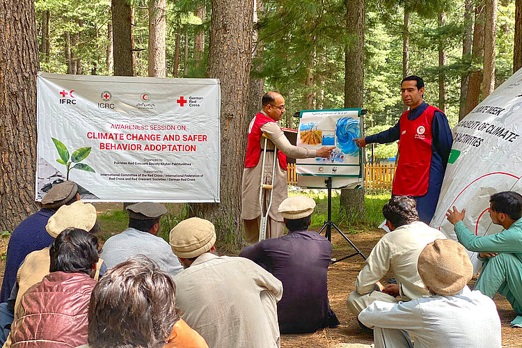 Volunteers giving presentation